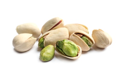 Tasty organic pistachio nuts on white background, closeup