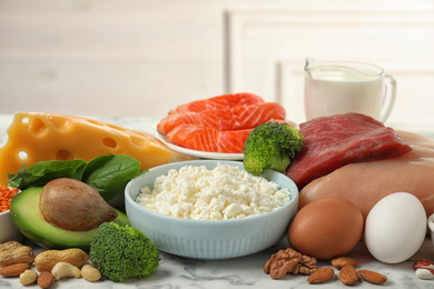 Different products rich in protein on table, closeup