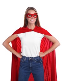 Confident woman wearing superhero cape and mask on white background