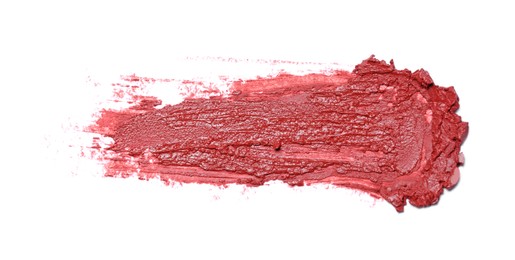 Photo of Smear of bright lipstick on white background, top view