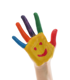 Kid with smiling face drawn on palm against white background, closeup