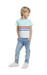 Cute little boy in casual outfit on white background