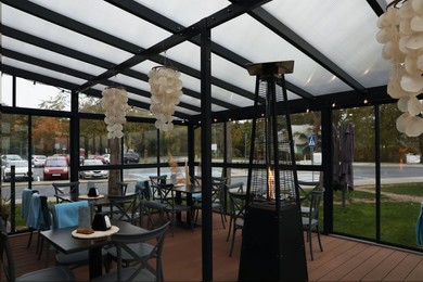 Photo of Beautiful restaurant with outdoor terrace. Real estate