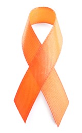 Photo of Orange ribbon isolated on white, top view. World Cancer Day
