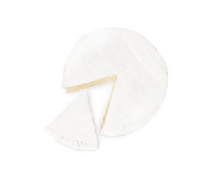 Tasty cut brie cheese on white background, top view