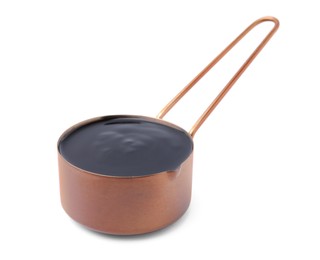 Photo of Metal small saucepan with balsamic glaze on white background