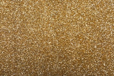 Beautiful shiny brass glitter as background, closeup
