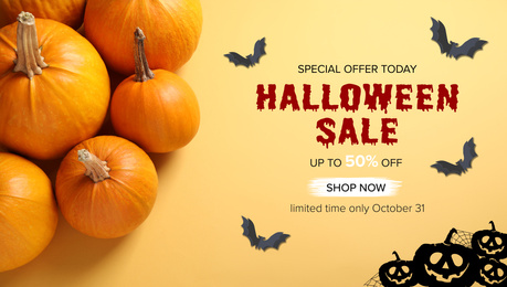Halloween sale ad design with pumpkins on pale yellow background