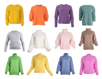 Set of different stylish warm sweaters on white background