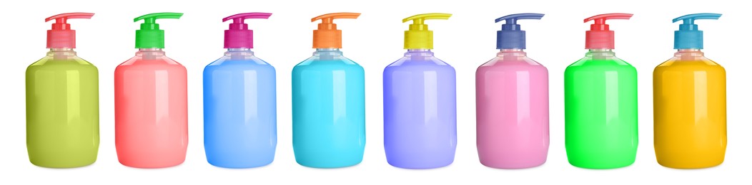 Set with bottles of multicolored liquid soap on white background. Banner design
