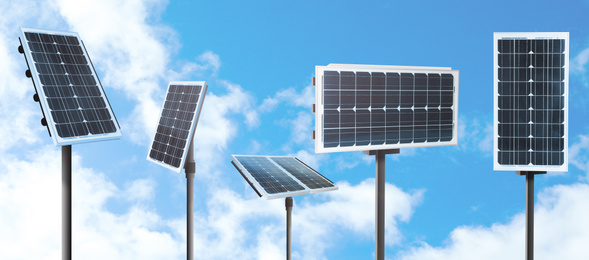 Set with different solar panels outdoors, banner design. Alternative energy source 