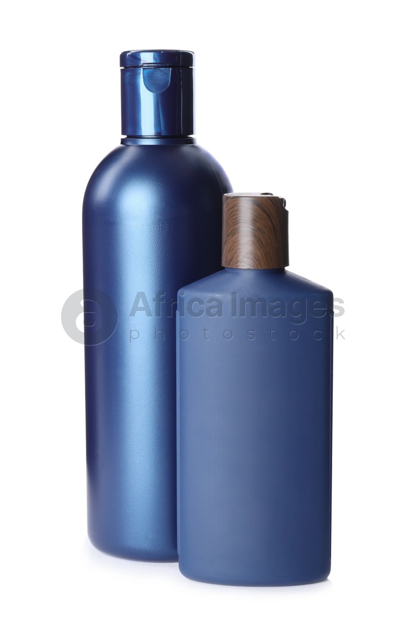 Photo of Bottles with shampoo and shower gel isolated on white. Men's cosmetic