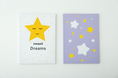 Adorable pictures of stars with words SWEET DREAMS on white wall. Children's room interior elements