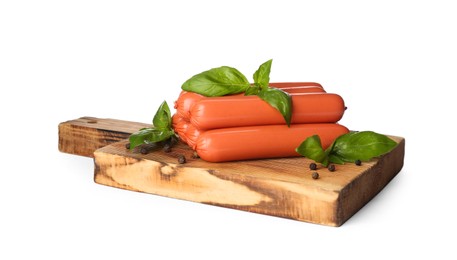 Raw vegetarian sausages with basil on white background