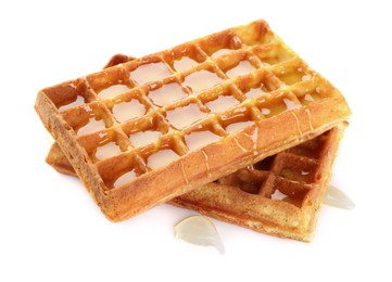 Photo of Two delicious Belgian waffles with honey on white background