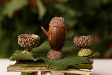 Photo of Tea set composition made of natural materials against blurred background, closeup