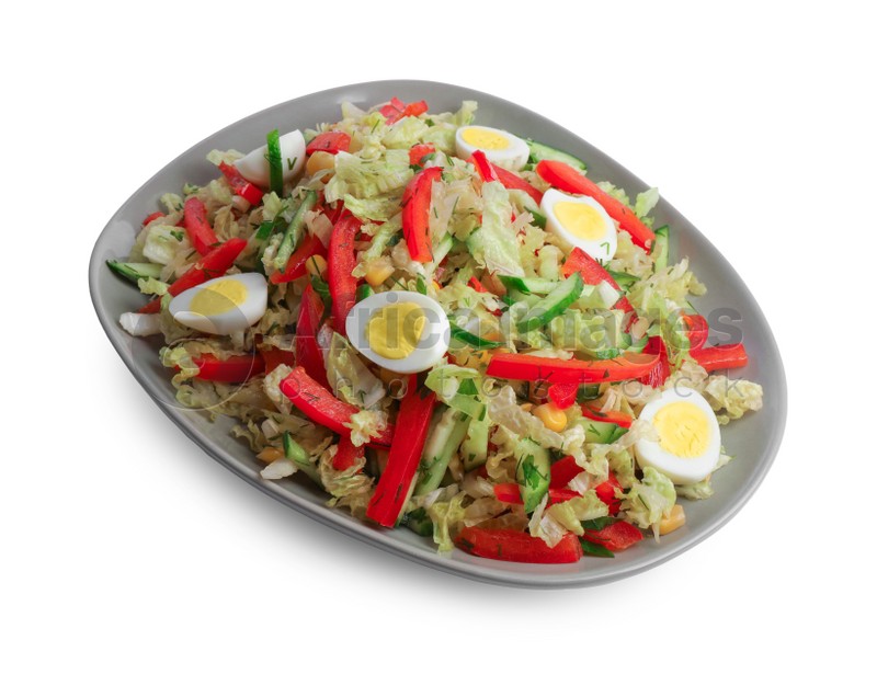 Plate of delicious salad with Chinese cabbage and quail eggs isolated on white