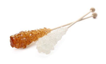 Wooden stick with sugar crystals isolated on white. Tasty rock candy