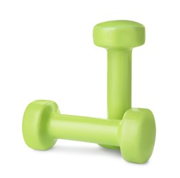 Green dumbbells on white background. Weight training equipment
