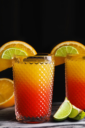 Fresh alcoholic Tequila Sunrise cocktails on marble board