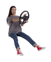 Photo of Angry woman on stool with steering wheel against white background
