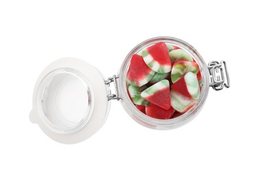 Tasty colorful candies in jar on white background, top view