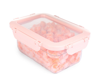 Frozen carrots in plastic container isolated on white. Vegetable preservation