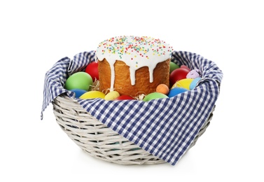 Traditional Easter cake and eggs in basket isolated on white