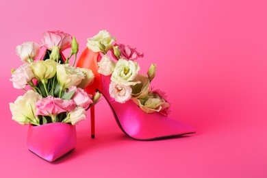 Stylish women's high heeled shoes with beautiful flowers on pink background, space for text