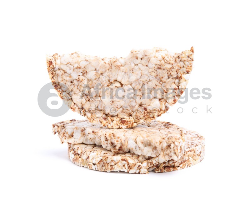 Tasty crunchy buckwheat cakes on white background