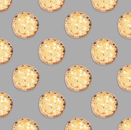 Many delicious cheese pizzas on light grey background, flat lay. Seamless pattern design