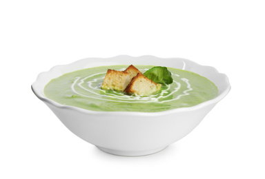 Delicious broccoli cream soup with croutons isolated on white