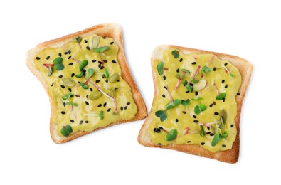 Delicious sandwiches with guacamole, microgreens and seeds on white background, top view