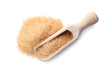 Photo of Wooden scoop and brown sugar on white background, top view