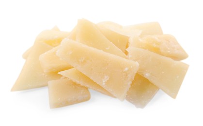 Pile of parmesan cheese pieces on white background