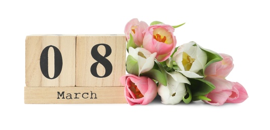 Wooden block calendar with date 8th of March and tulips on white background. International Women's Day