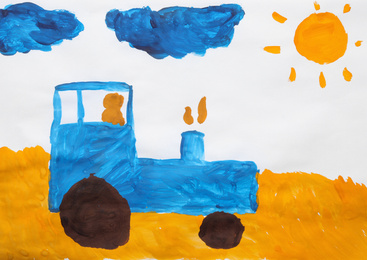 Child's painting of tractor in field on white paper