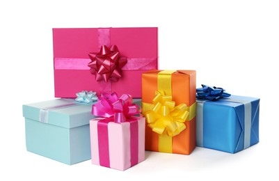 Colorful gift boxes with bows on white background