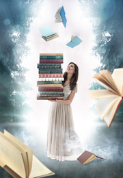 Image of Beautiful woman with stack of books in foggy forest