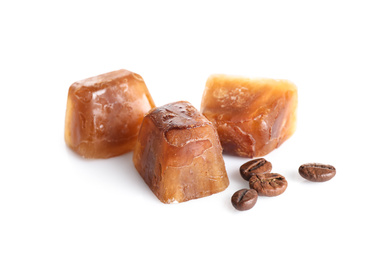 Coffee ice cubes and beans on white background