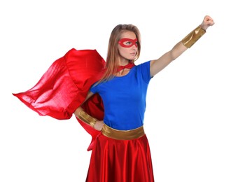 Confident woman wearing superhero costume on white background
