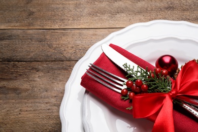 Beautiful Christmas table setting on wooden background, closeup