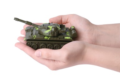 Man with toy tank on white background, closeup