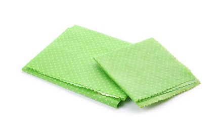 Green reusable beeswax food wraps on white background