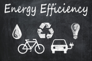 Energy efficiency concept. Different icons drawn on blackboard