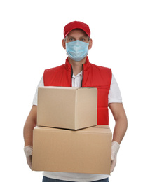 Courier in protective mask and gloves holding cardboard boxes on white background. Delivery service during coronavirus quarantine