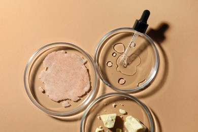 Photo of Flat lay composition with Petri dishes on beige background
