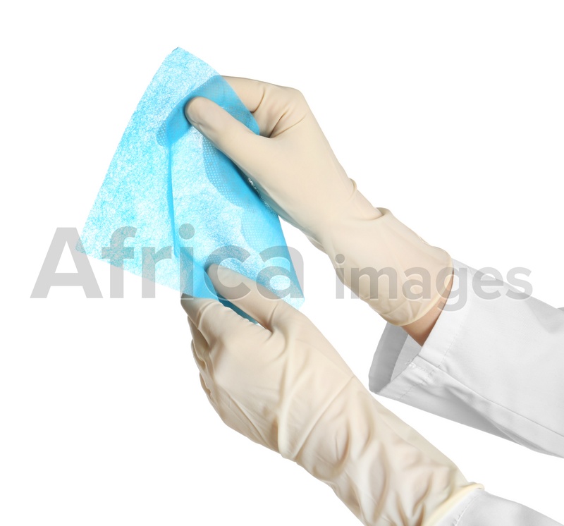 Doctor in medical gloves holding cloth on white background