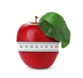 Red apple with measuring tape on white background. Slimming, weight loss concept