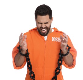 Emotional prisoner in jumpsuit with chained hands on white background